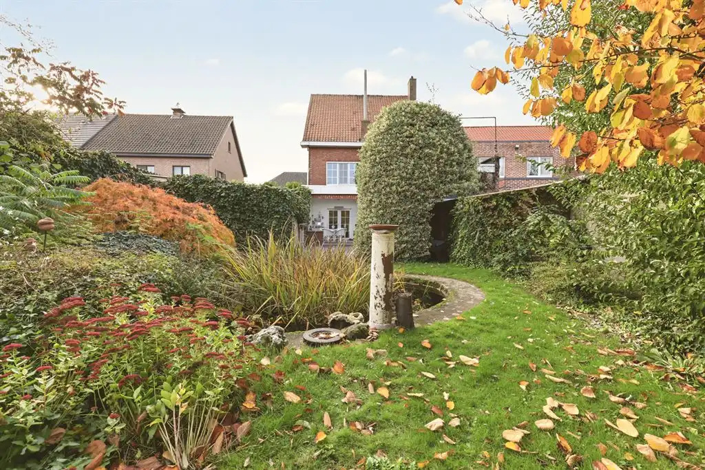 Charmante halfopen woning met grote tuin te Turnhout foto 10