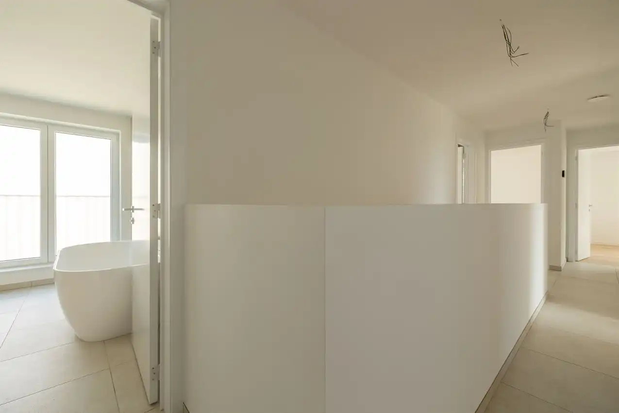 Instapklare nieuwbouwwoning met 4 slaapkamers, 2 badkamers en E-peil 9 foto 32