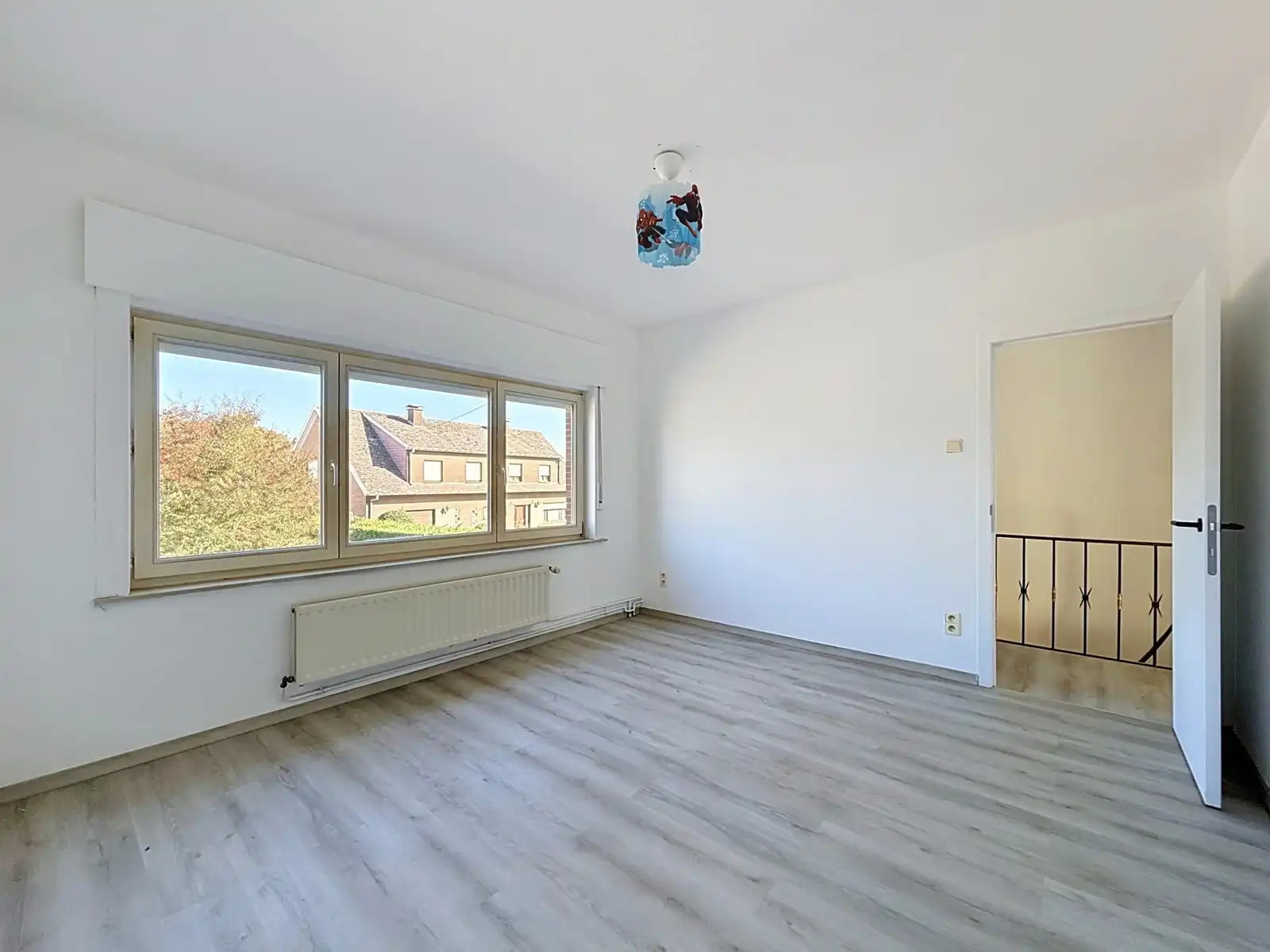 Gezinswoning met 2 SLPK, Tuin én Garage! foto 10