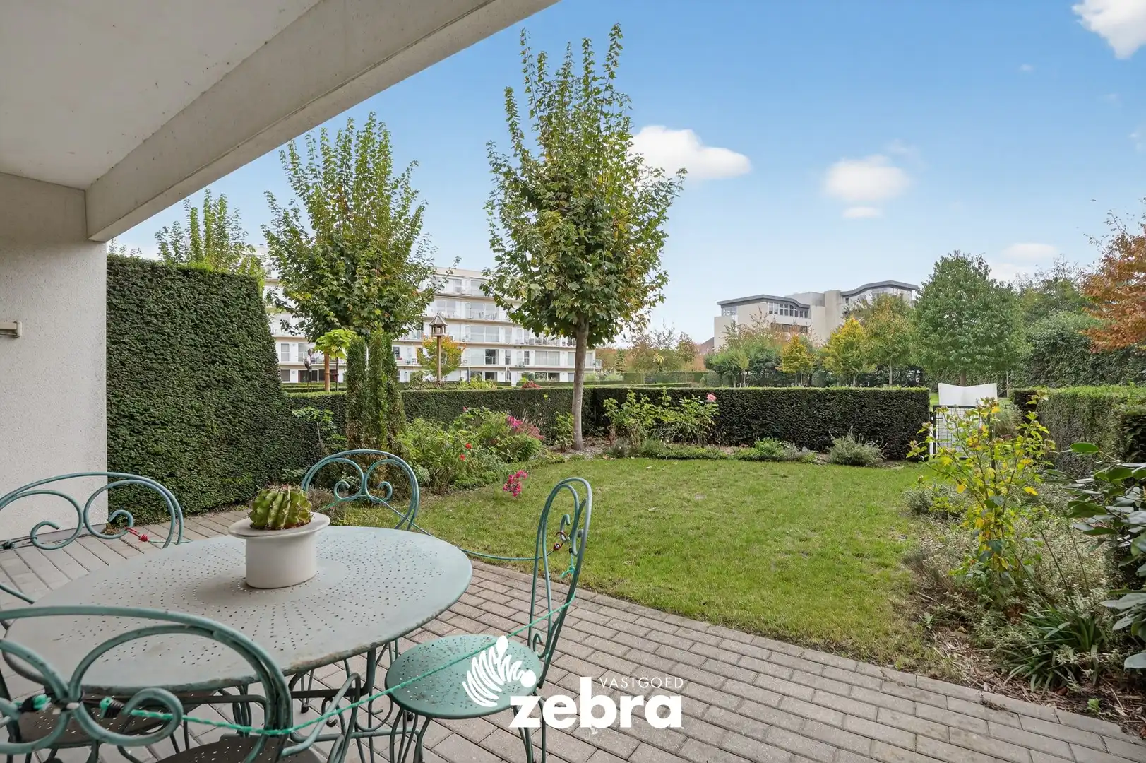 Gelijkvloers appartement met zuidoost gerichte tuin te Roeselare! foto 17