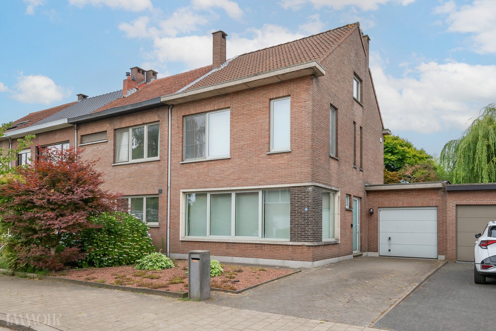 Halfopen gezinswoning in rustige wijk in Ekeren-Donk foto {{pictureIndex}}