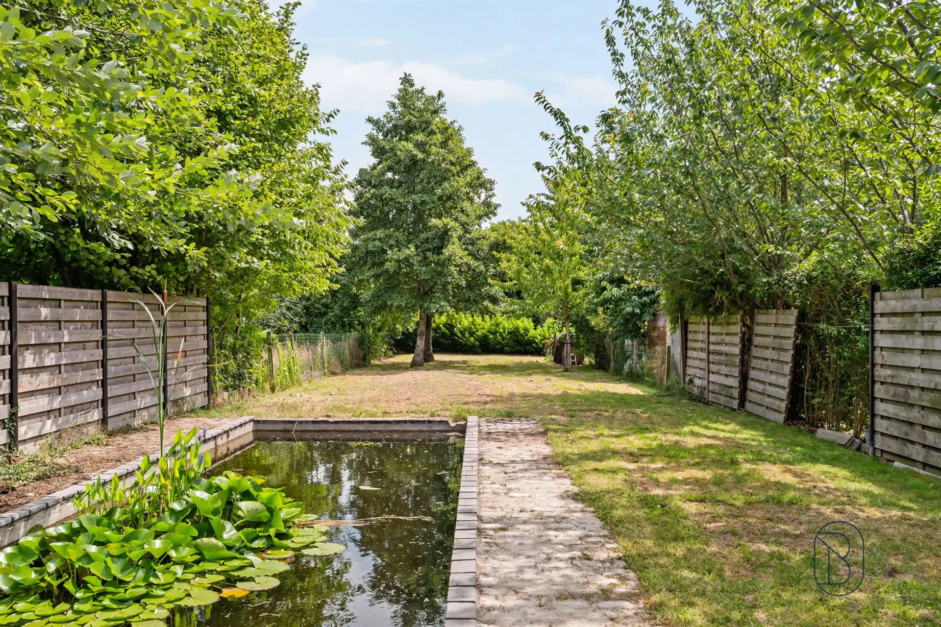 Knap gerenoveerde woning met 3 à 4 slk, en zwemvijver foto 4