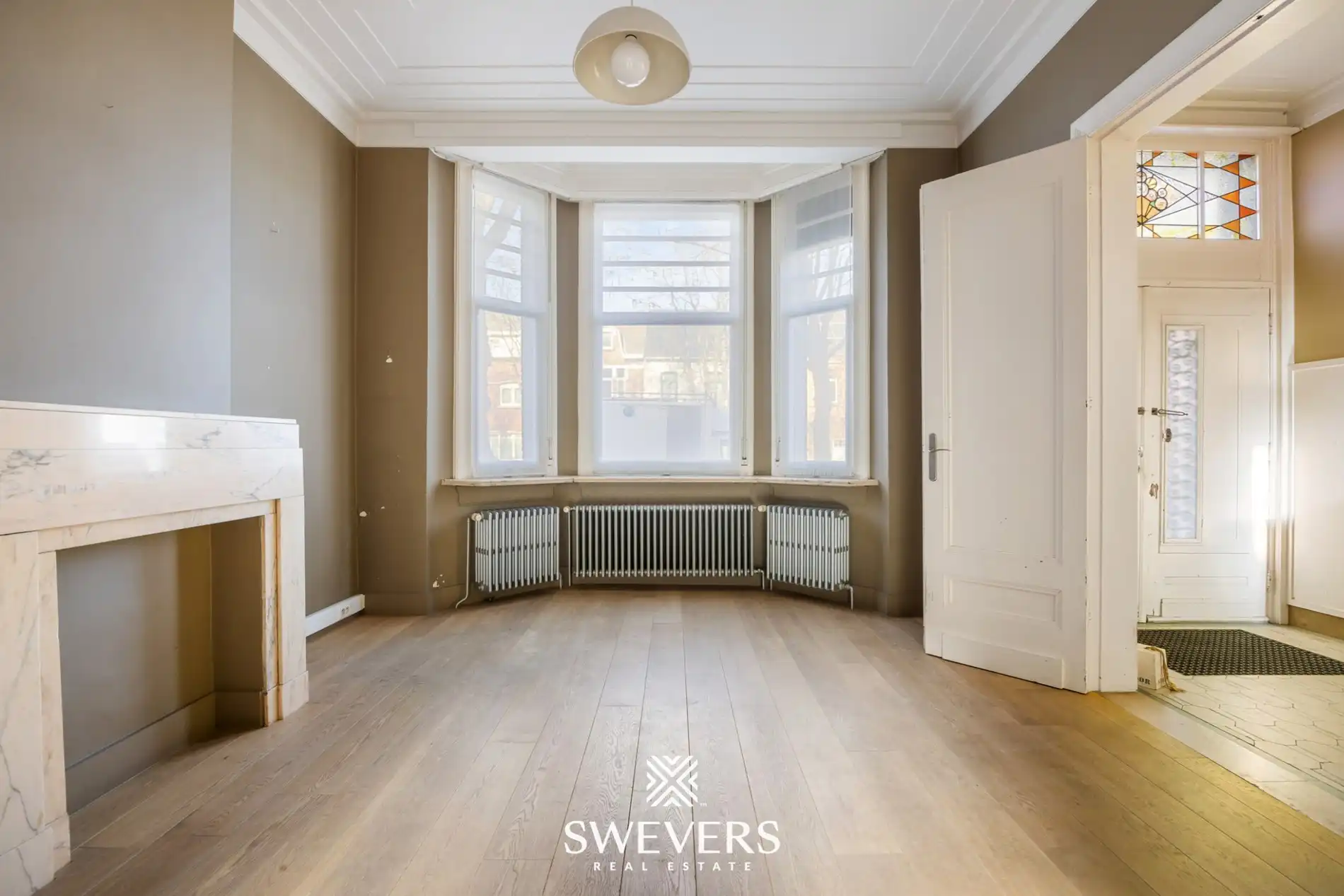 Karaktervol herenhuis met 6 slaapkamers, 2 badkamers en tuintje in Mol foto 5