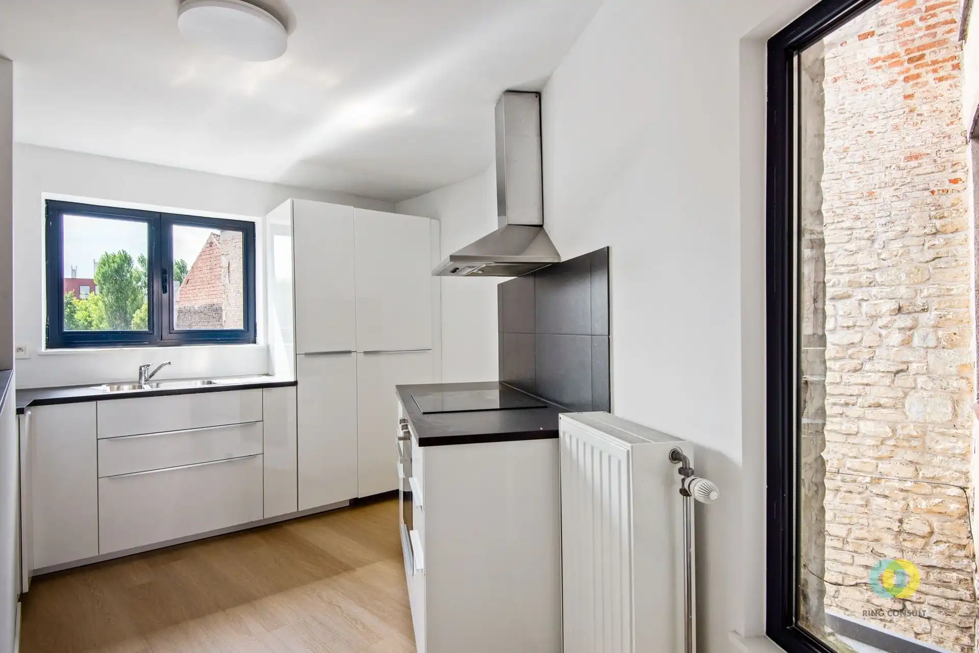 Gebouw met handelsgelijkvloers en duplexappartement foto 7