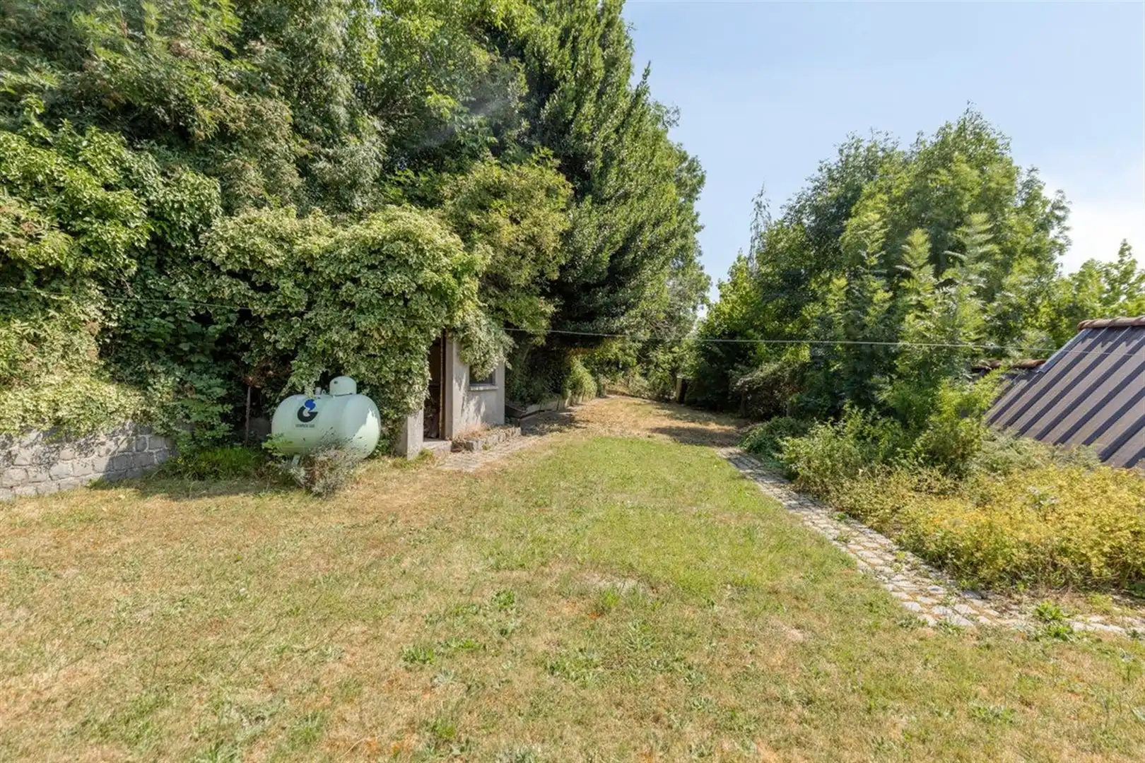 Mooi gelegen te renoveren woning op de Wolvenberg foto 3