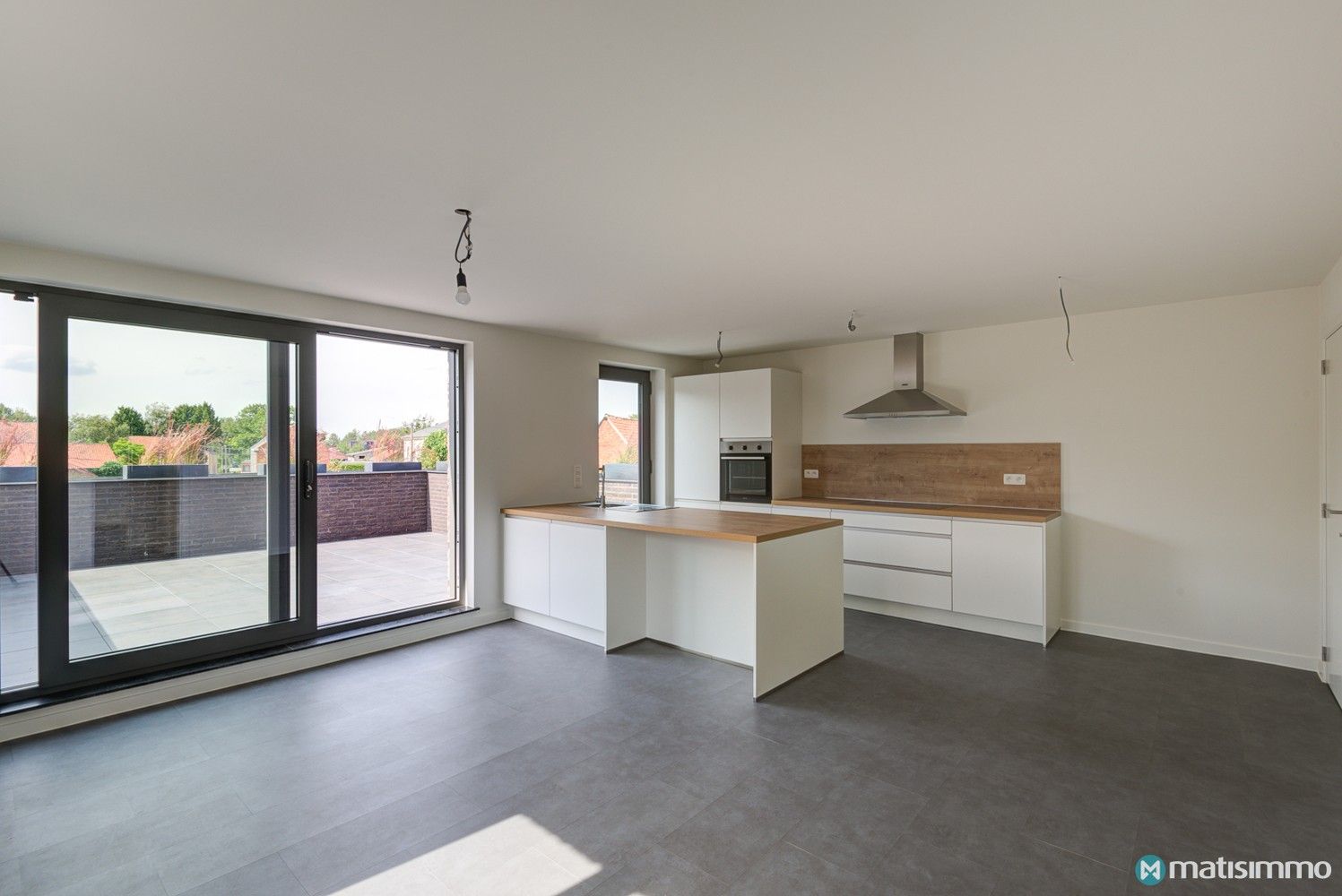 INSTAPKLAAR DUPLEXAPPARTEMENT MET 2 SLAAPKAMERS EN CARPORT IN MOPERTINGEN (BILZEN) foto 3