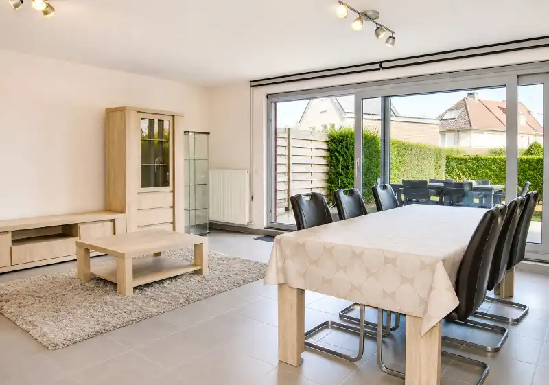 Gemeubeld gelijkvloers appartement met tuin – Heffen foto 4