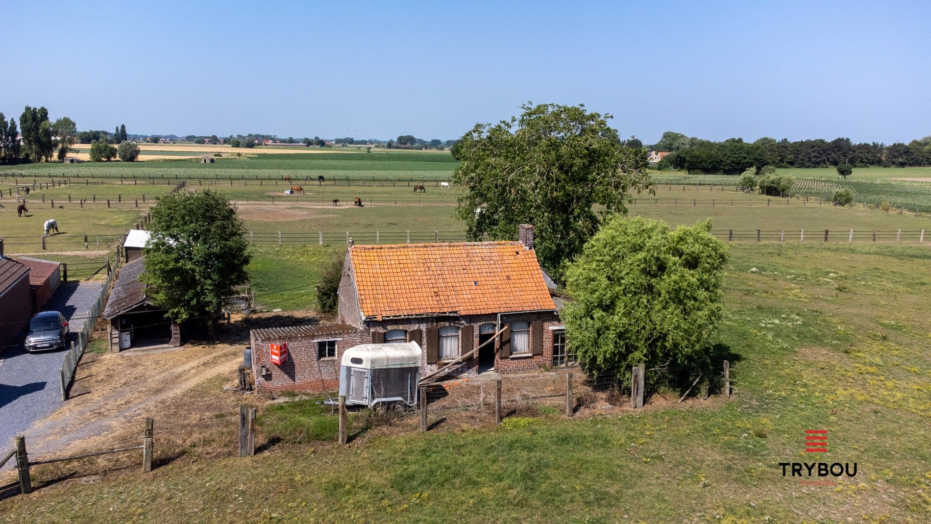 Landelijke, te renoveren woning op 9245 m² in Houthulst op rustige ligging foto 7
