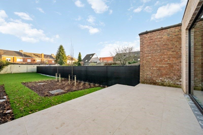 Gelijkvloers en zeer energiezuinig appartement met mooie tuin ! foto 2