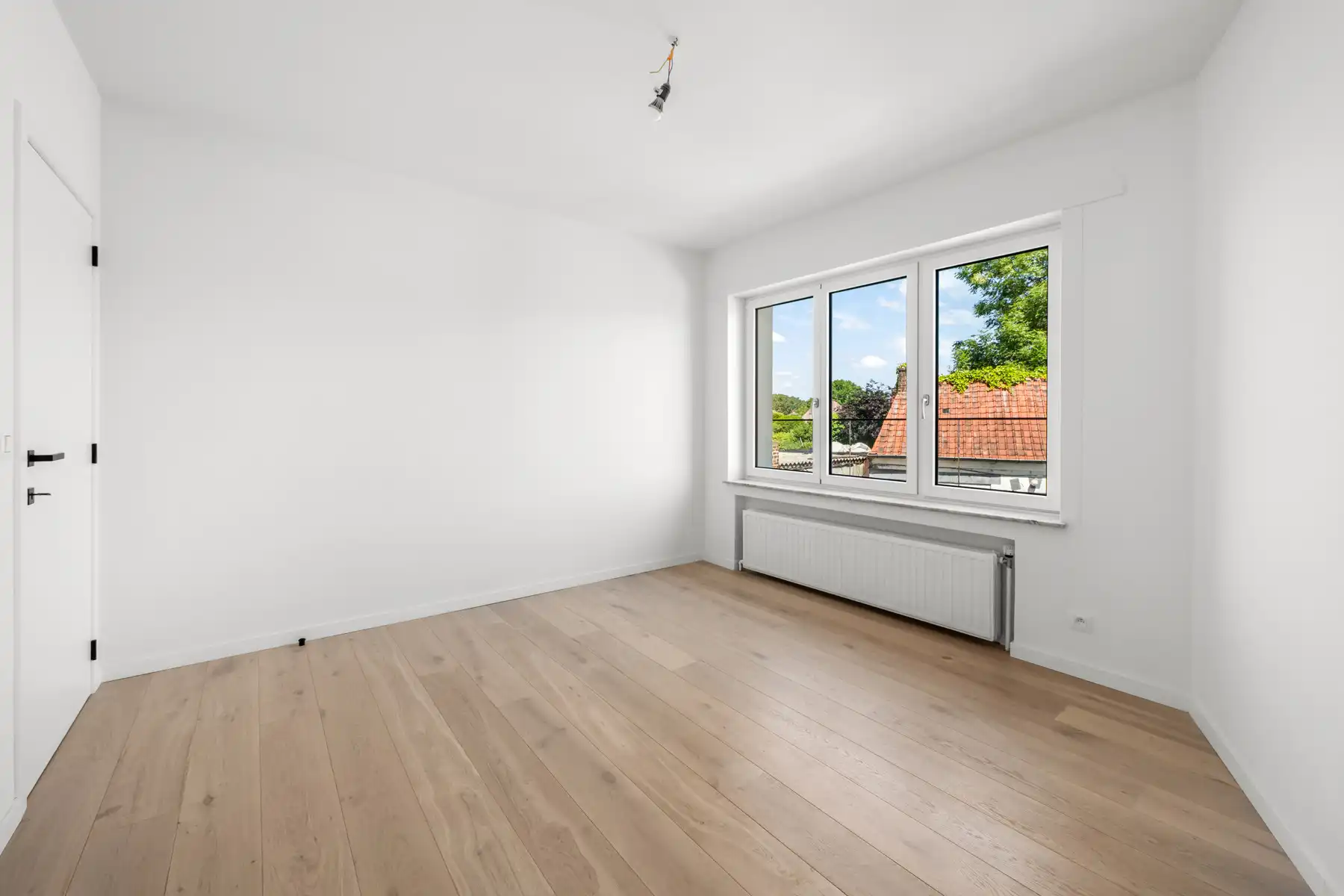 Gerenoveerd 2 slaapkamerappartement met garage foto 12