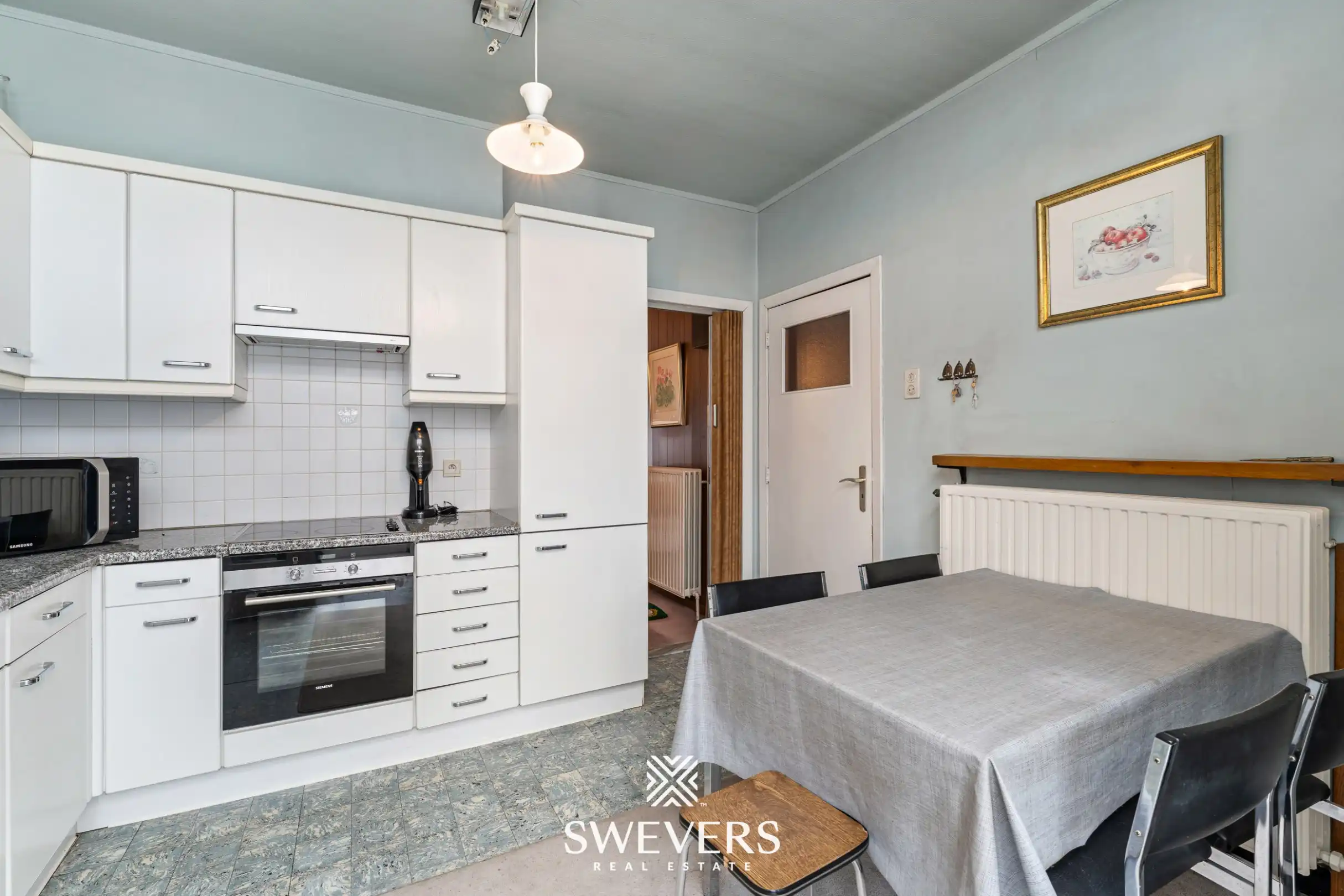 Woning met 4 slaapkamers en ruime garage in het centrum foto 8