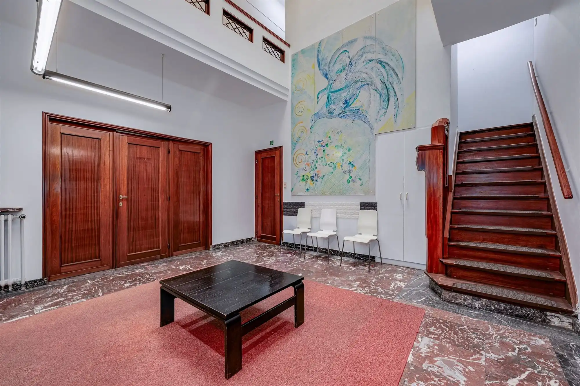 Ruime woning met veelzijdige praktijkruimtes foto 3