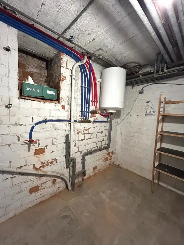 Instapklaar gelijkvloers 1-slaapkamerappartement met ruim terras in Leuven foto 14