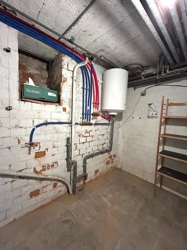 Instapklaar gelijkvloers 1-slaapkamerappartement met ruim terras in Leuven foto 14