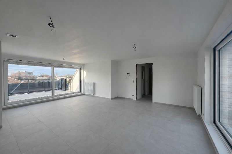 Appartement op het tweede verdiep met ruim terras voor- en achteraan. foto 4