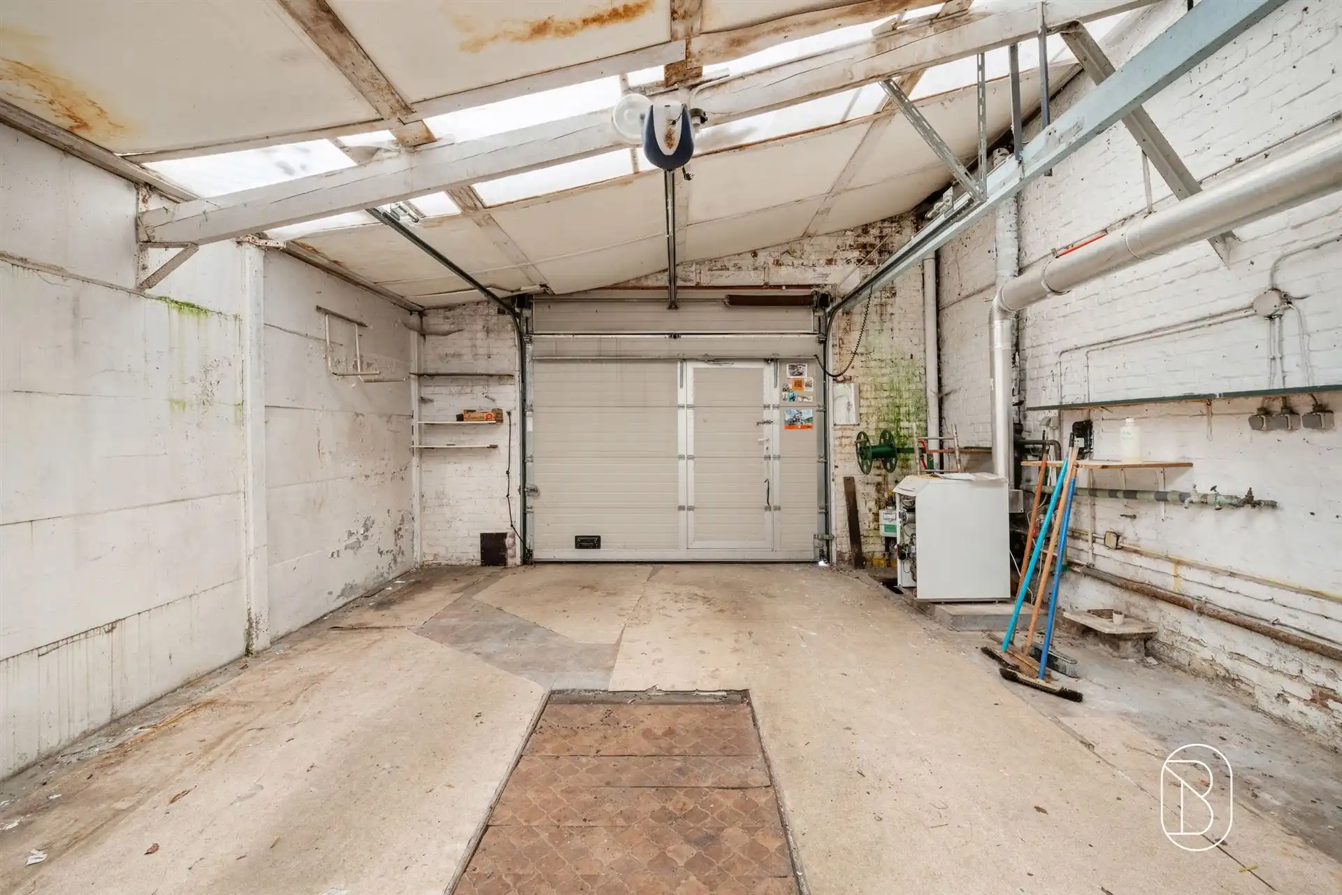 Woning met tuin en grote garage  foto 4