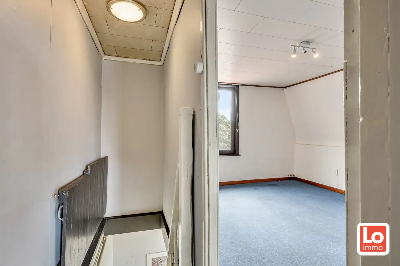 Leuke halfopen starterswoning met afzonderlijke garage en koertje op landelijke locatie in Mendonk. foto 11