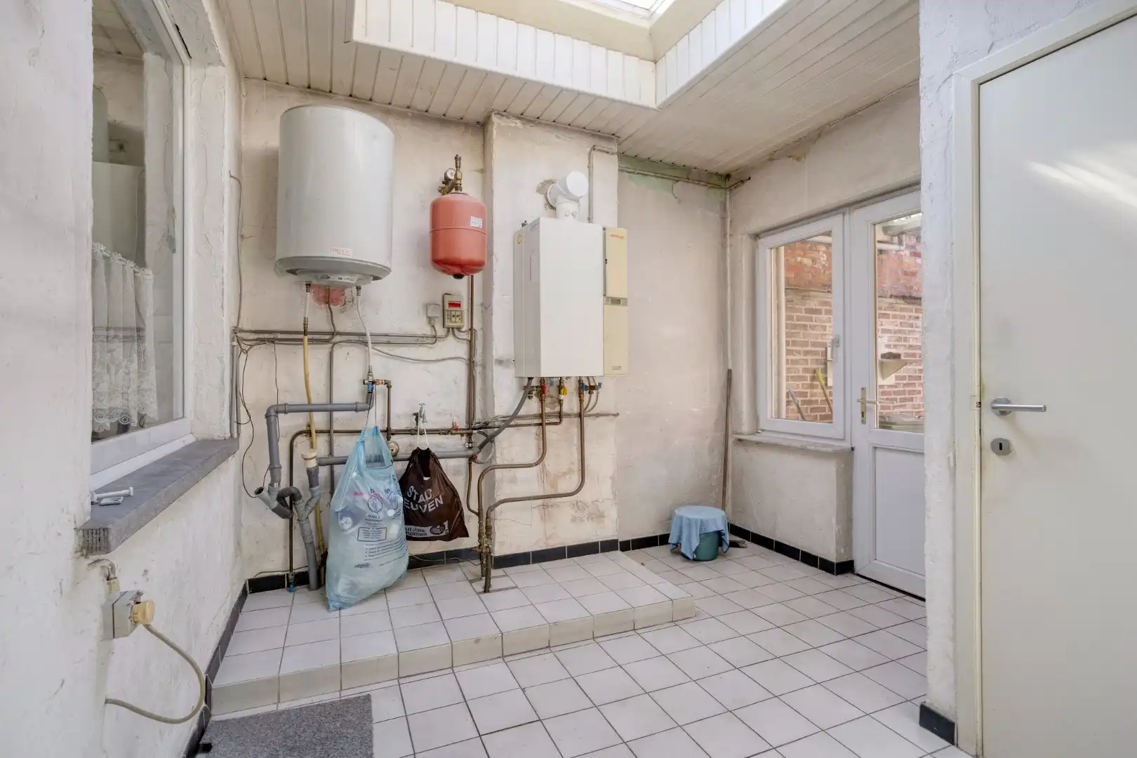 Centraal gelegen rijwoning in Kessel-Lo met parking - EPC 246 kwh/m² foto 11