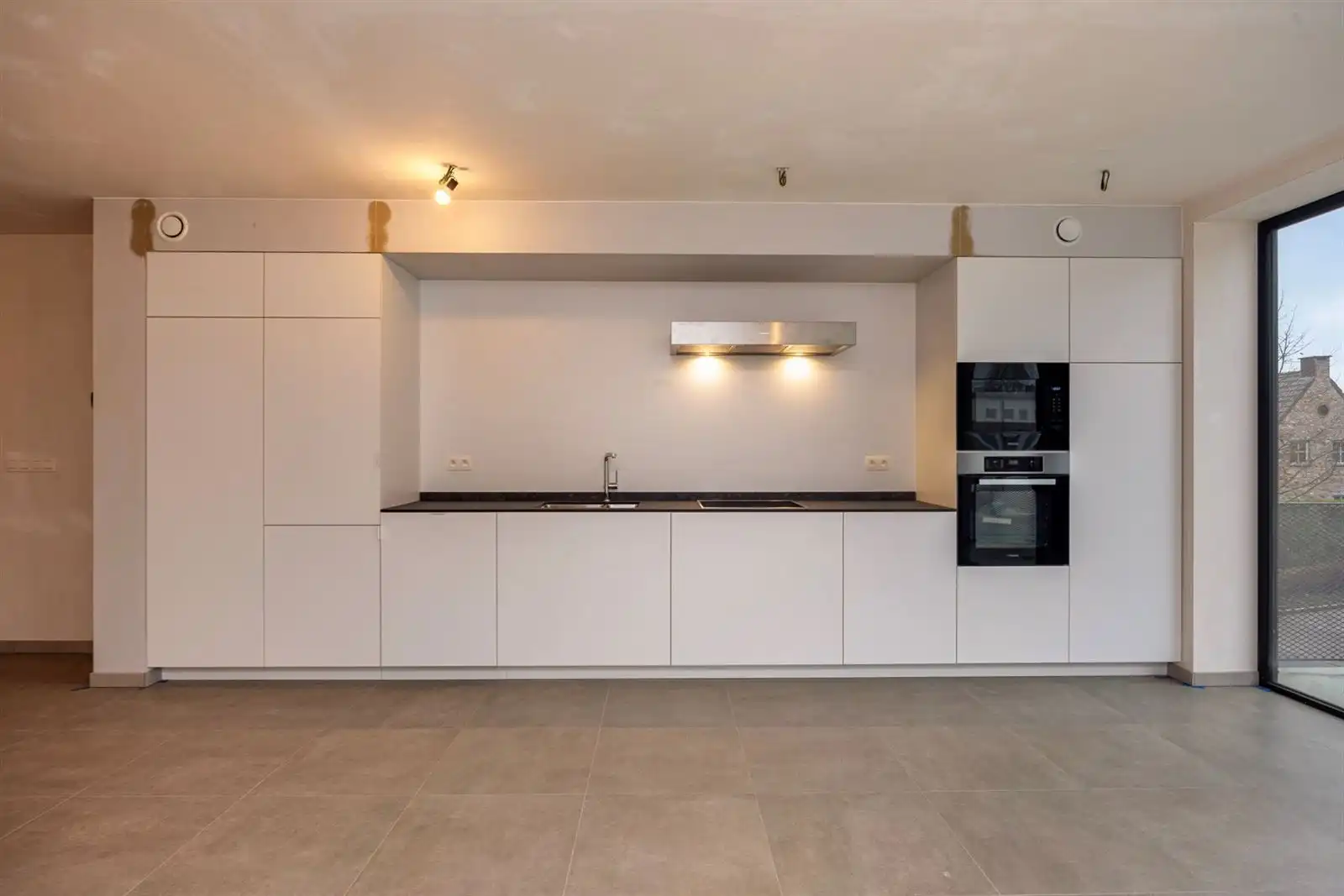 Triplex-appartement met 2 slaapkamers, bureau, terras en staanplaatsen. foto 6