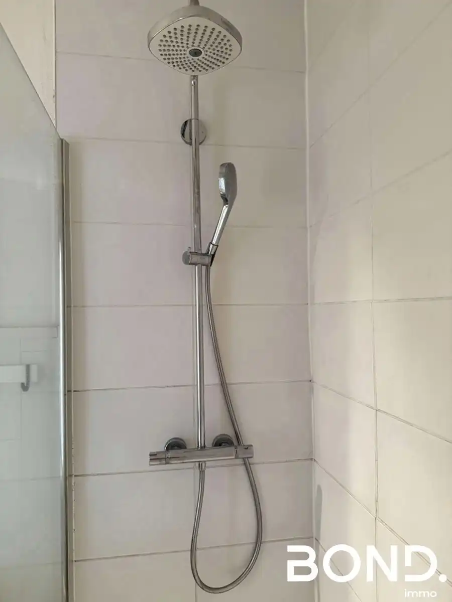 Instapklaar 3-slaapkamerappartment met parking in Leuven foto 13