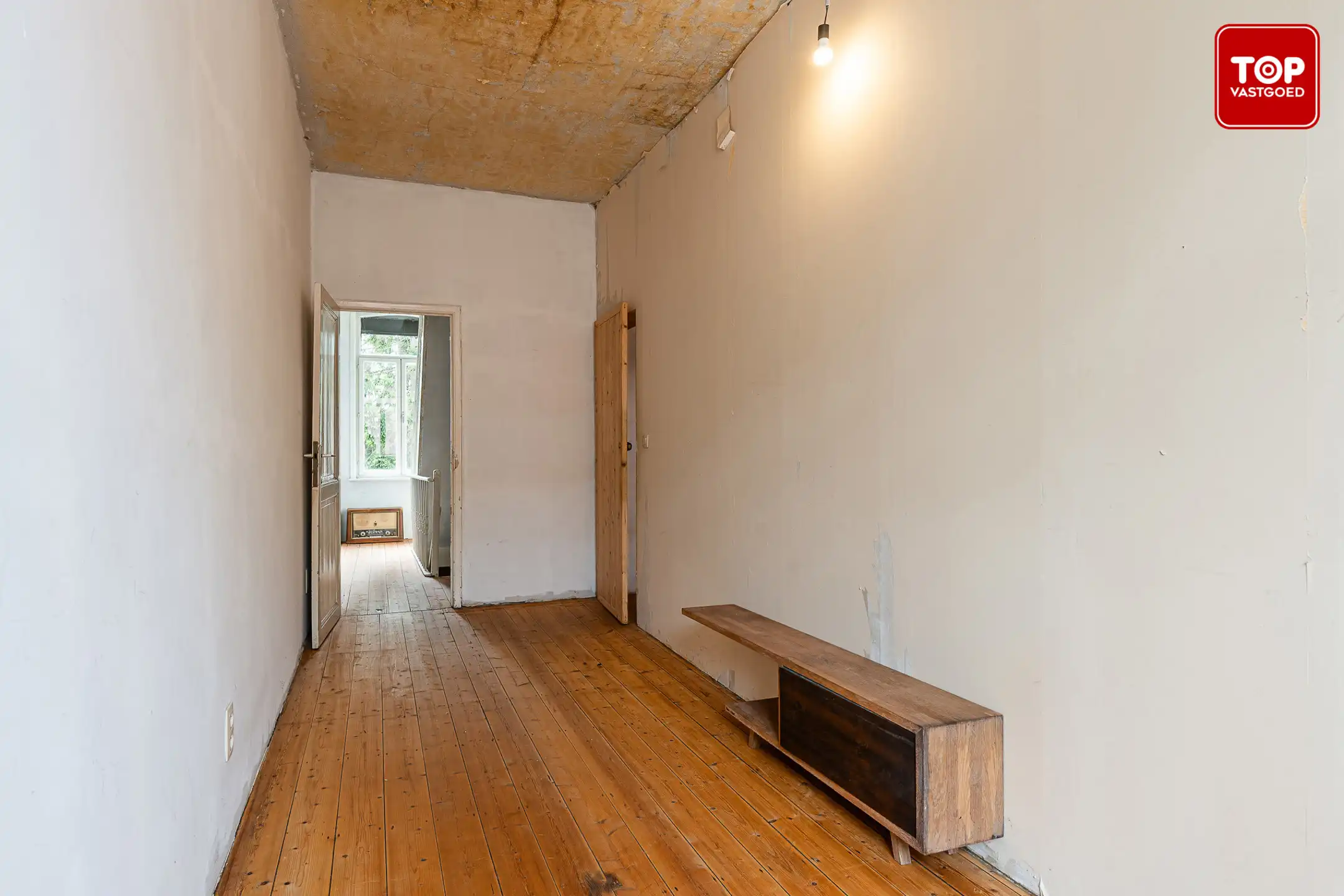 Woning met 3 slaapkamers en leuke tuin op toplocatie. foto 14