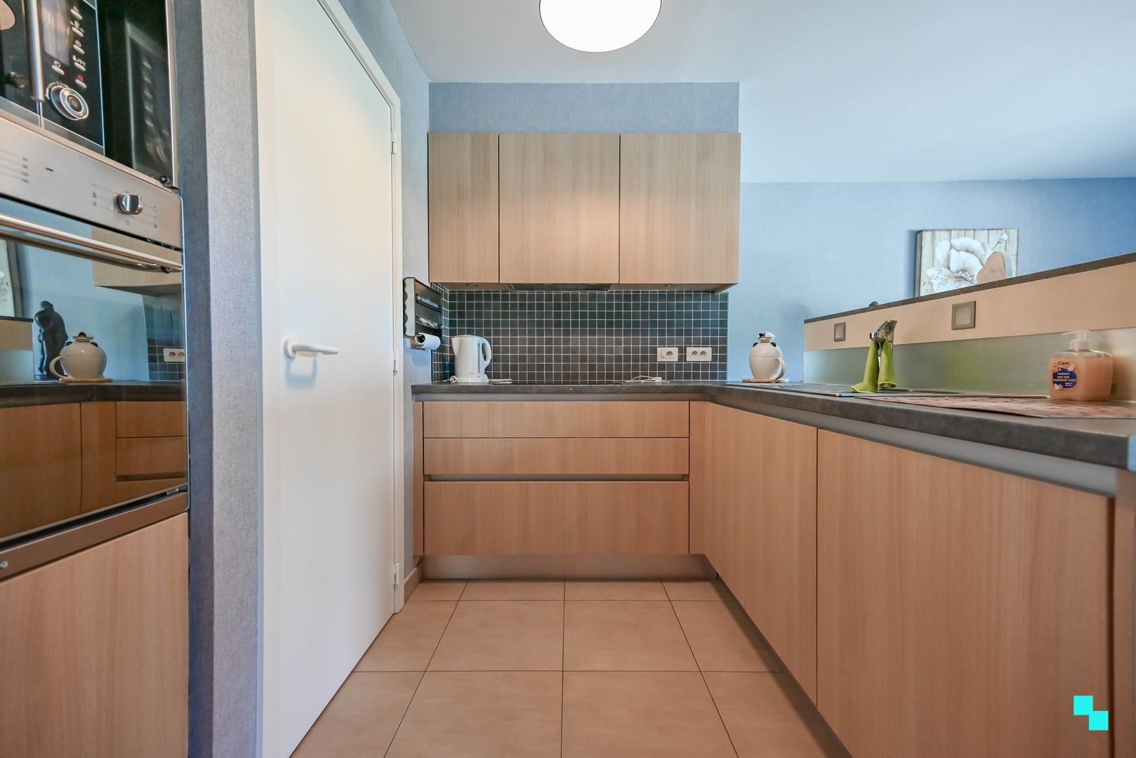 Ruim tweeslaapkamer appartement nabij centrum Izegem foto 13