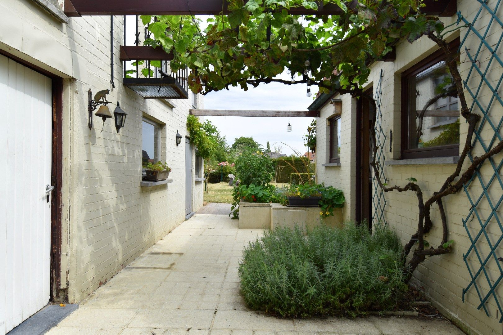 Charmante alleenstaande woning met 3 slaapkamers, tuin en garage in een rustige straat te Rollegem foto 17