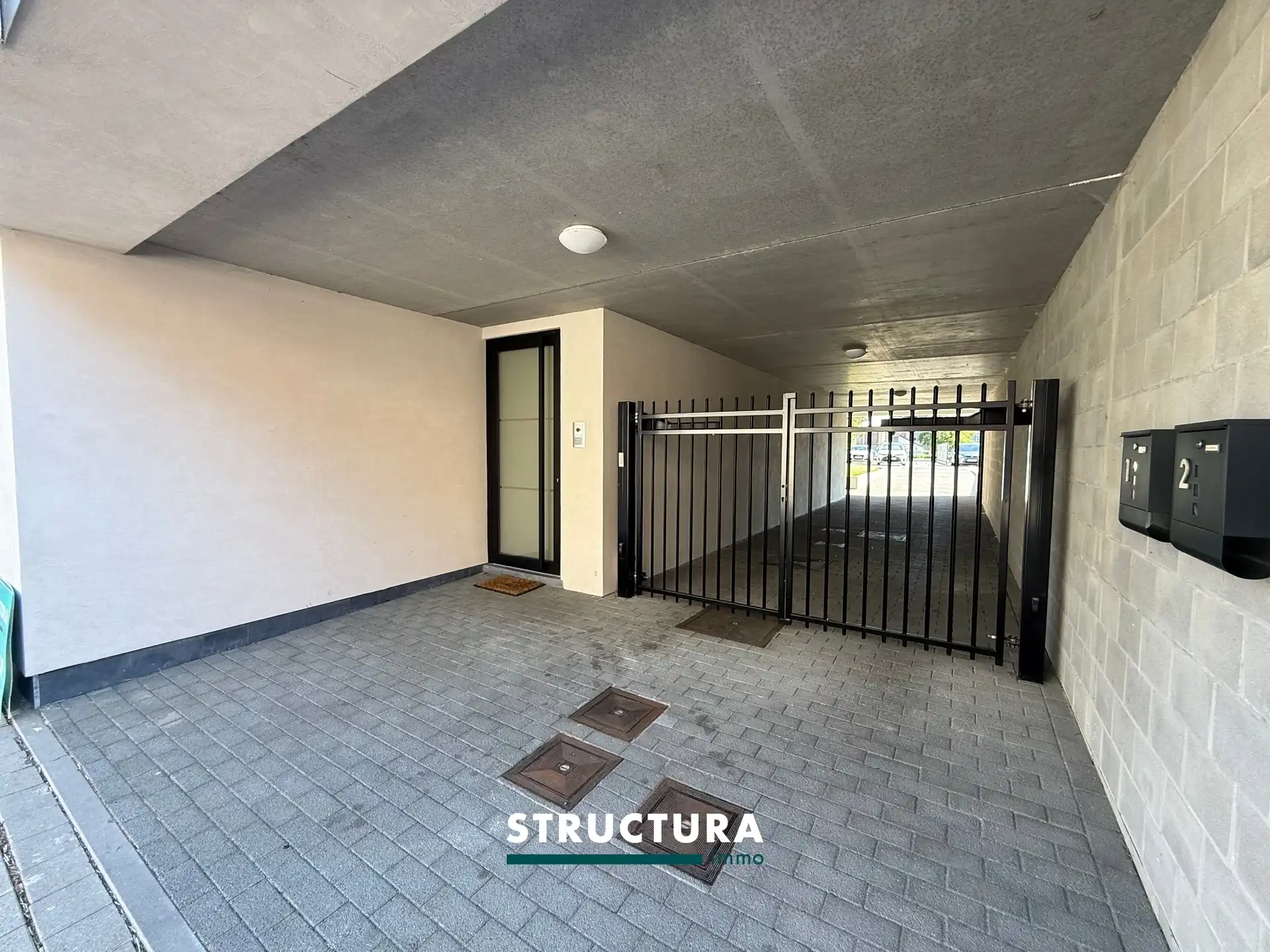 Appartement met 2 slaapkamers en 2 staanplaatsen in centrum Merchtem foto 13