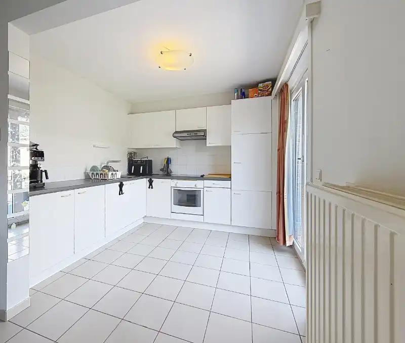 Gelijkvloers appartement met tuin en garage foto 4