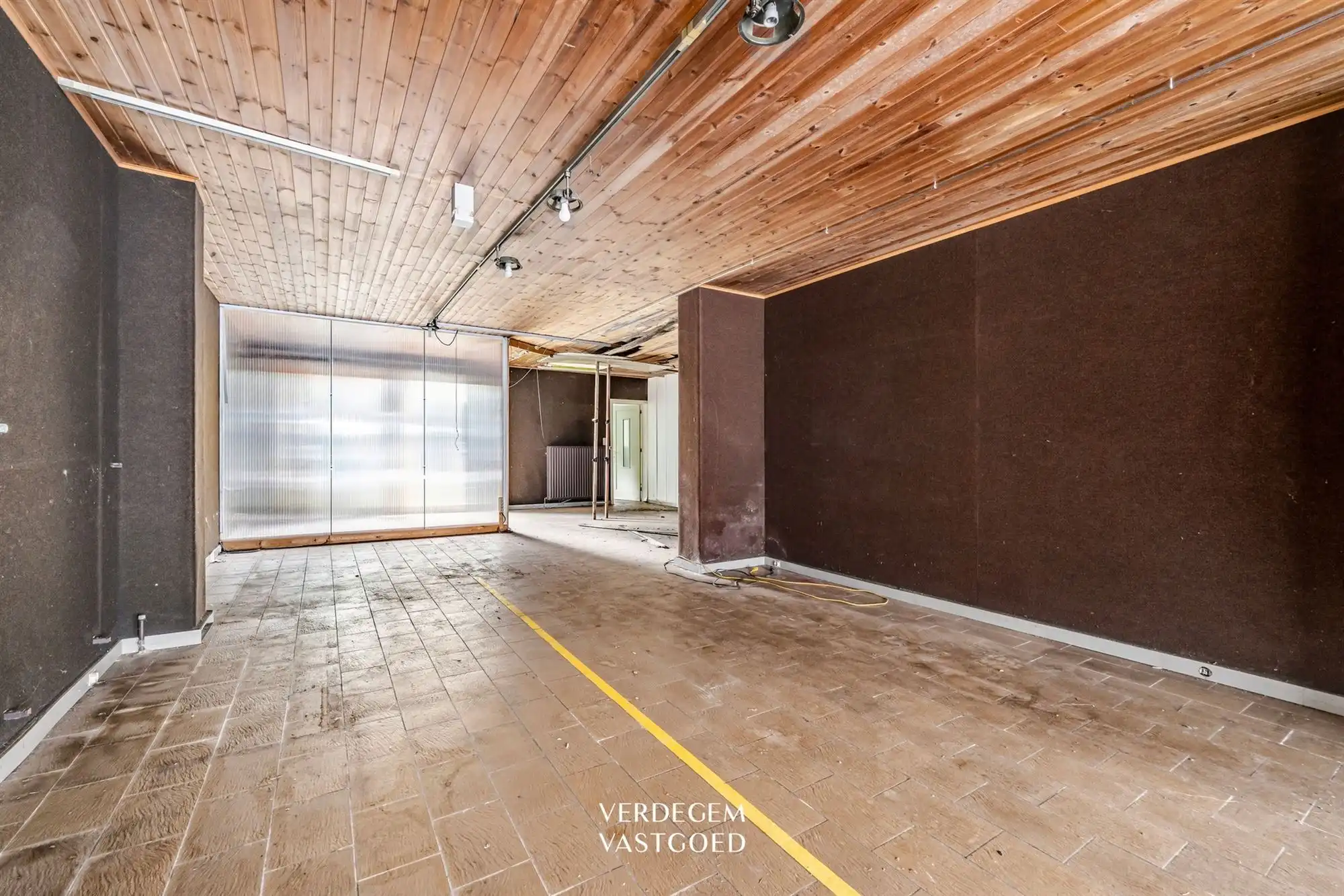 Renovatieproject: centraal gelegen handelspand met woonst en tuin foto 3