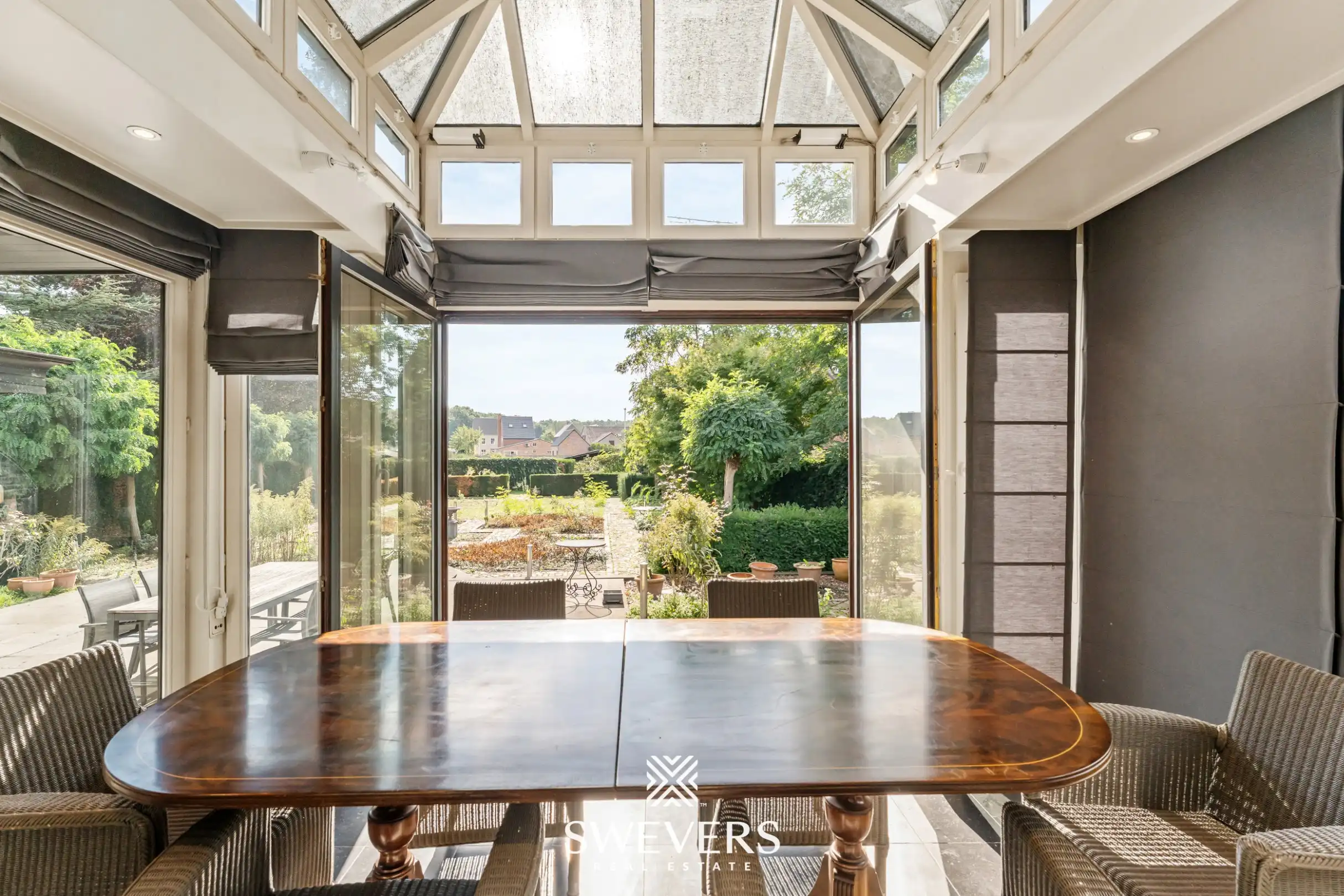 Knappe woning met orangerie, mogelijkheid tot 4 slpk en achterliggende bouwgrond foto 9
