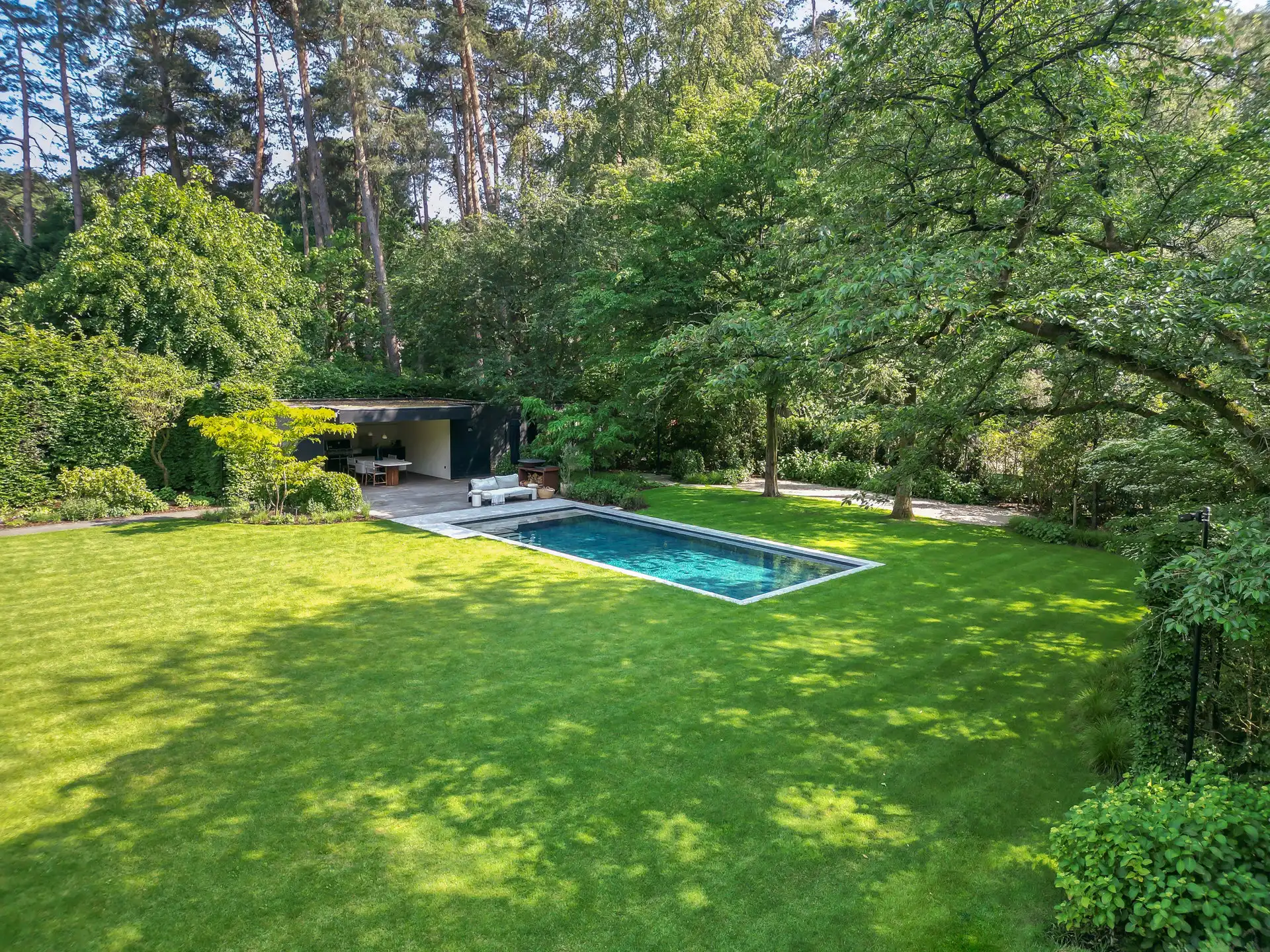 Architectenvilla met zwembad en ZW tuin in Hof Ter Linden foto 26