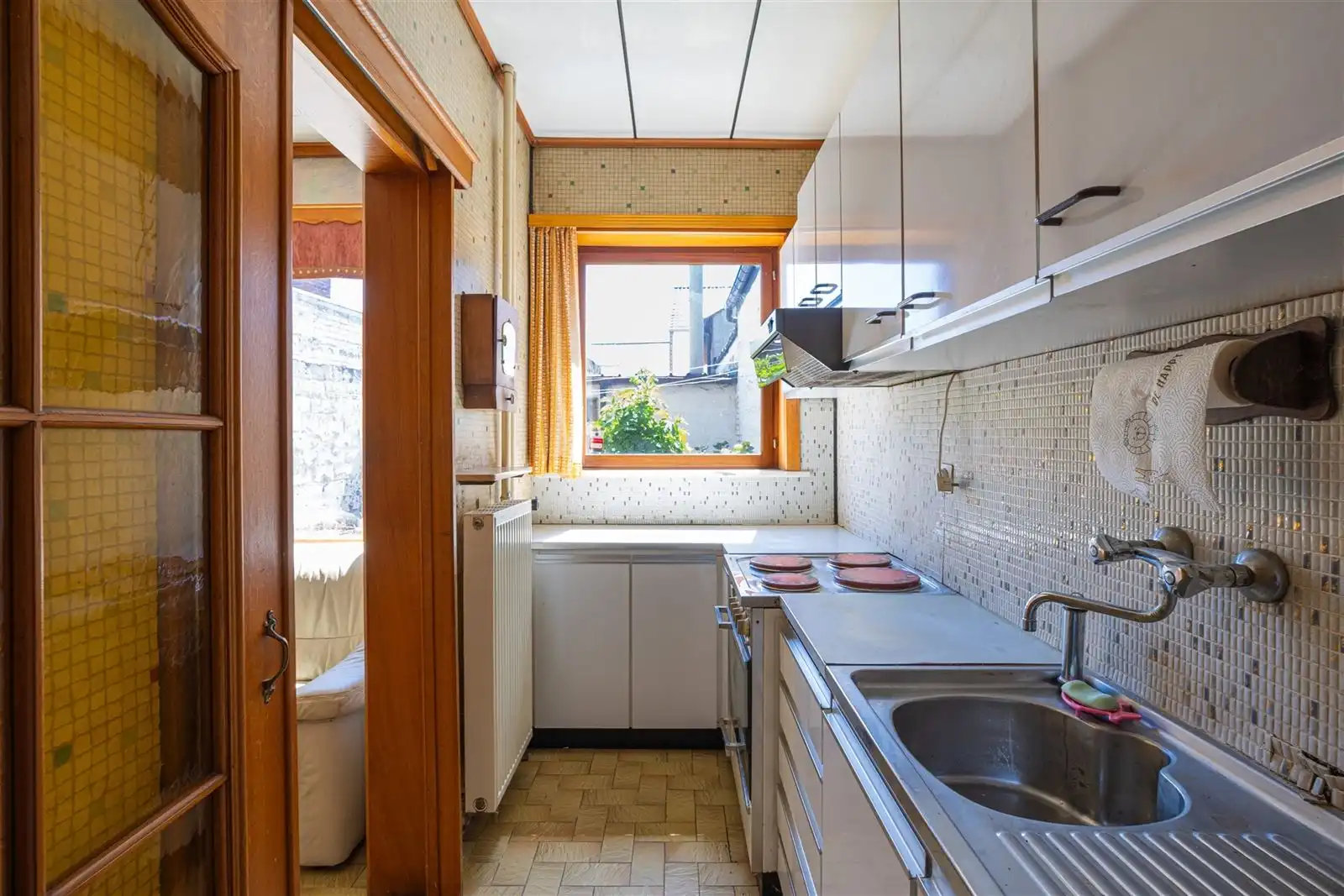Te renoveren woning mét garage foto 7
