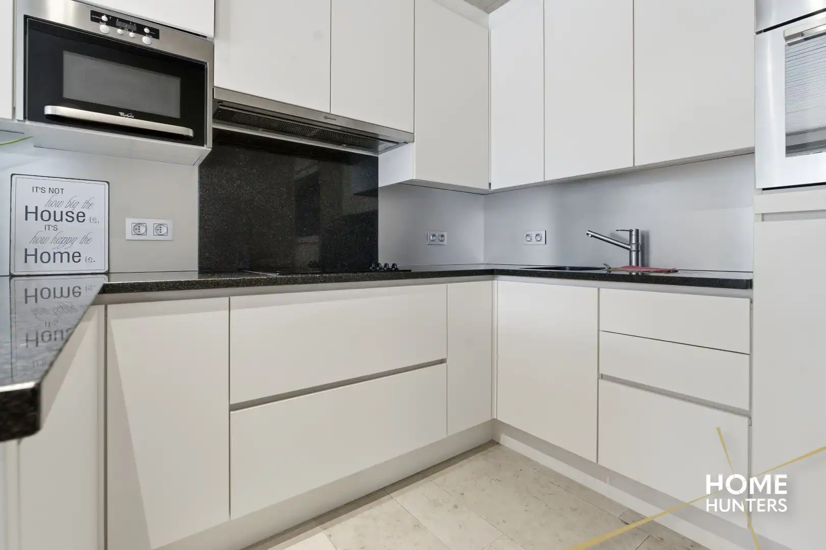 Halfopen bebouwing met alle wooncomfort op het gelijkvloers foto 6