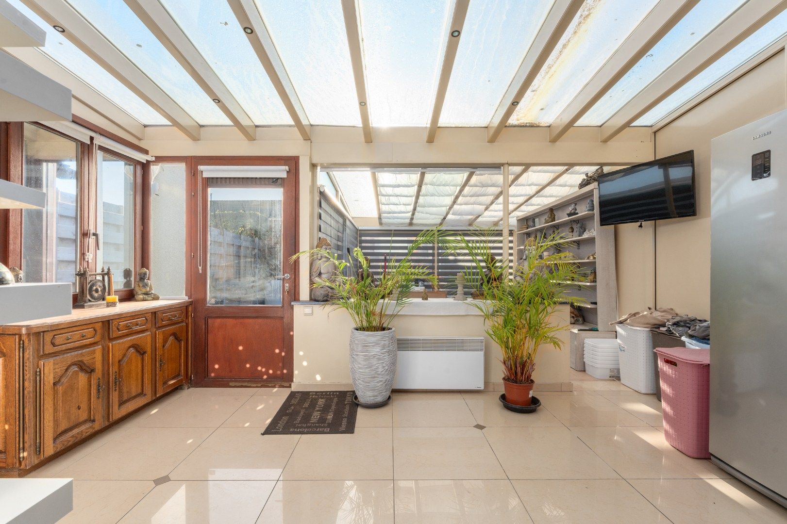 Charmante rijwoning met zonnig terras, wellnessruimte en garagebox in de Vicognewijk foto 6