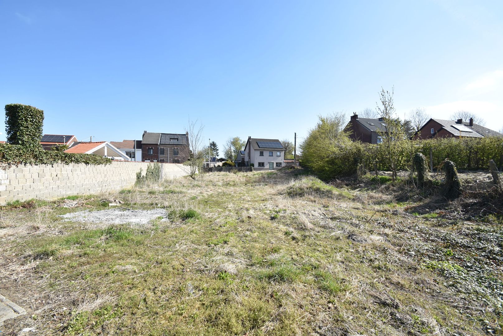 Perceel bouwgrond bestemd voor open bebouwing op 7a 96ca - 21,95 m breedte aan de straatzijde - zuid-gerichte tuin foto 5