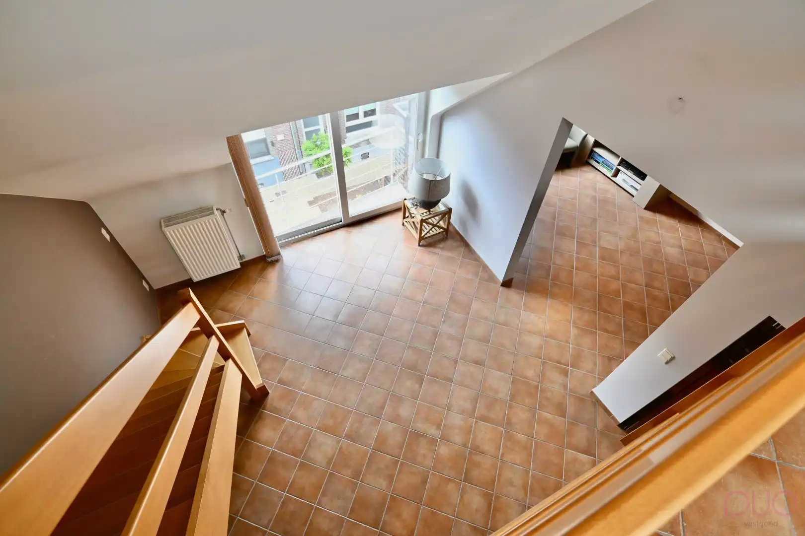 Instapklaar duplex appartement met terras en garagebox op toplocatie in Sint-Truiden foto 4