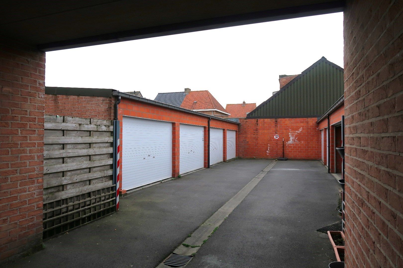 Opbrengsteigendom met 3 appartementen en 3 garageboxen. Ideale investering! foto 24