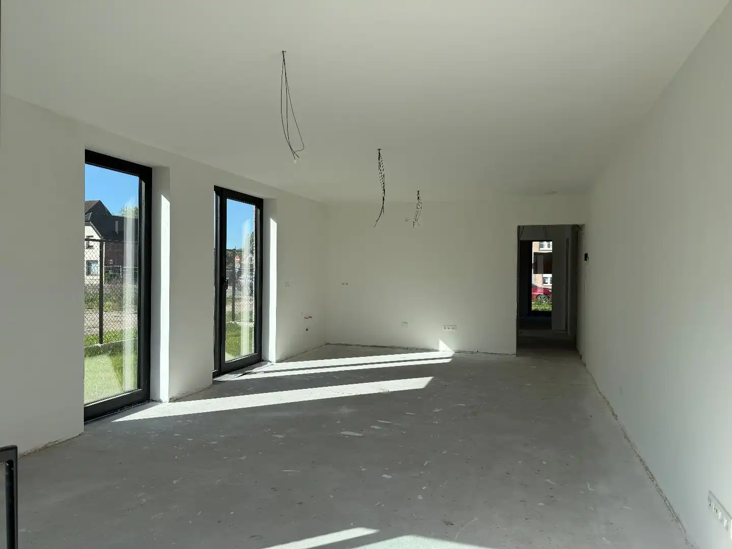 Gelijkvloers 2-slpk appartement met tuin, 2 stpls en een kelder foto 4