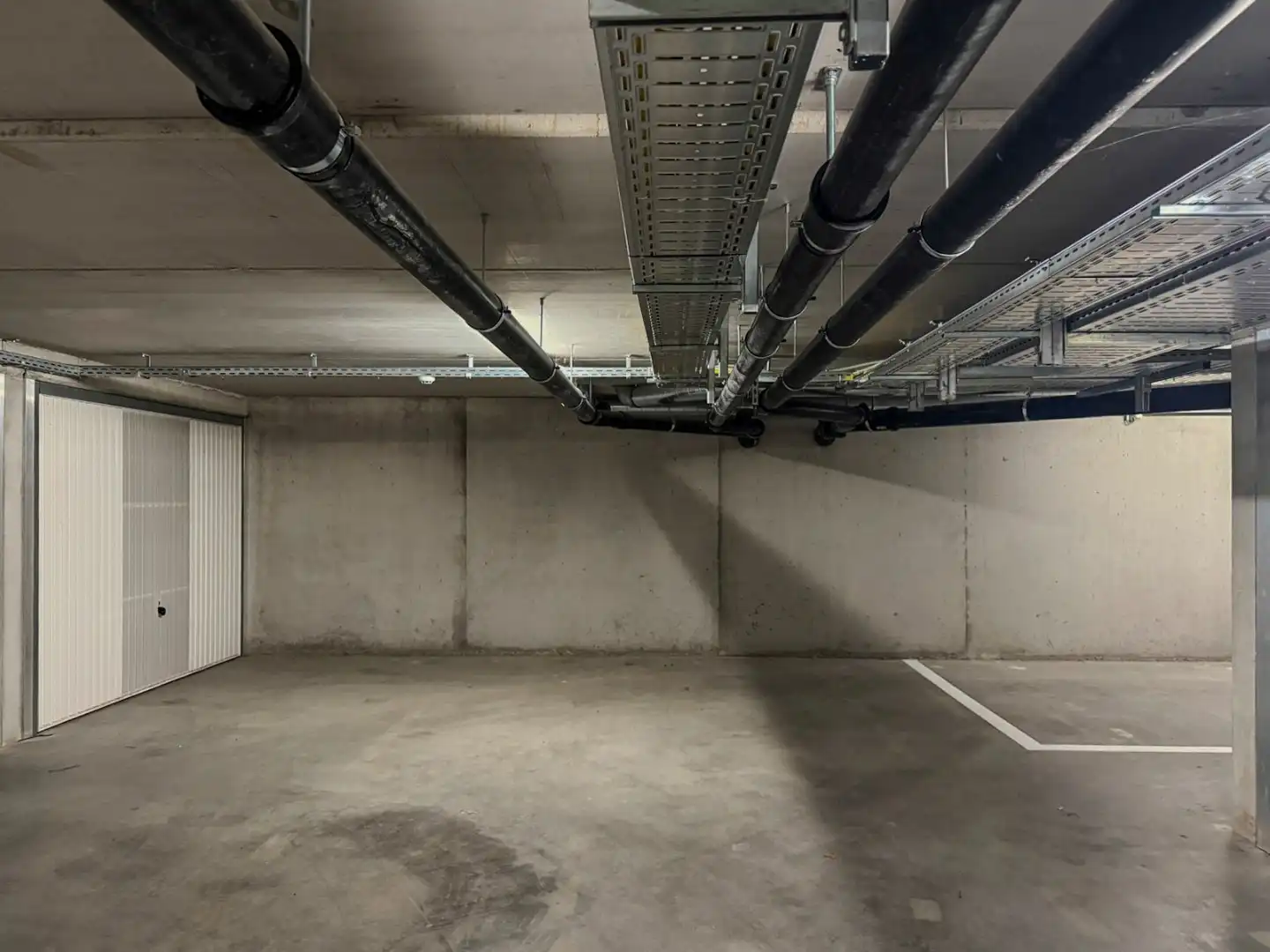 Veilige en vlot toegankelijke ondergrondse staanplaats. foto 4