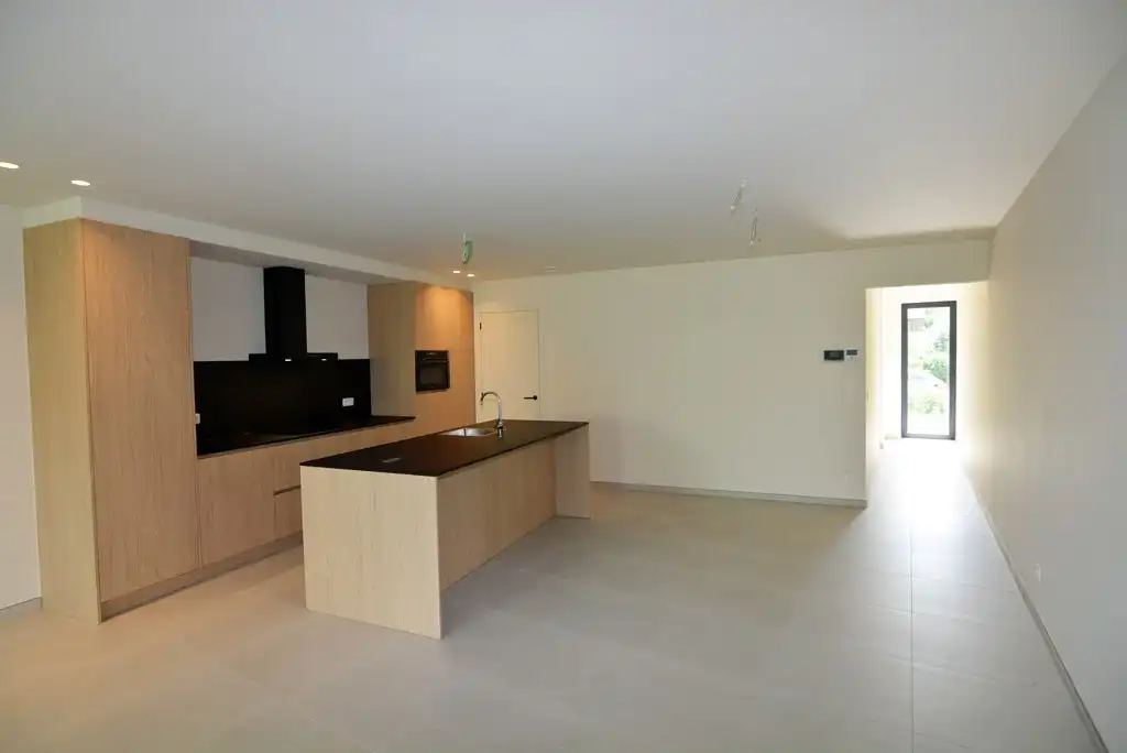 Gelijkvloers nieuwbouwappartement 124 m² met 2 slpk, tuintje en 2 autostandplaatsen. foto 9