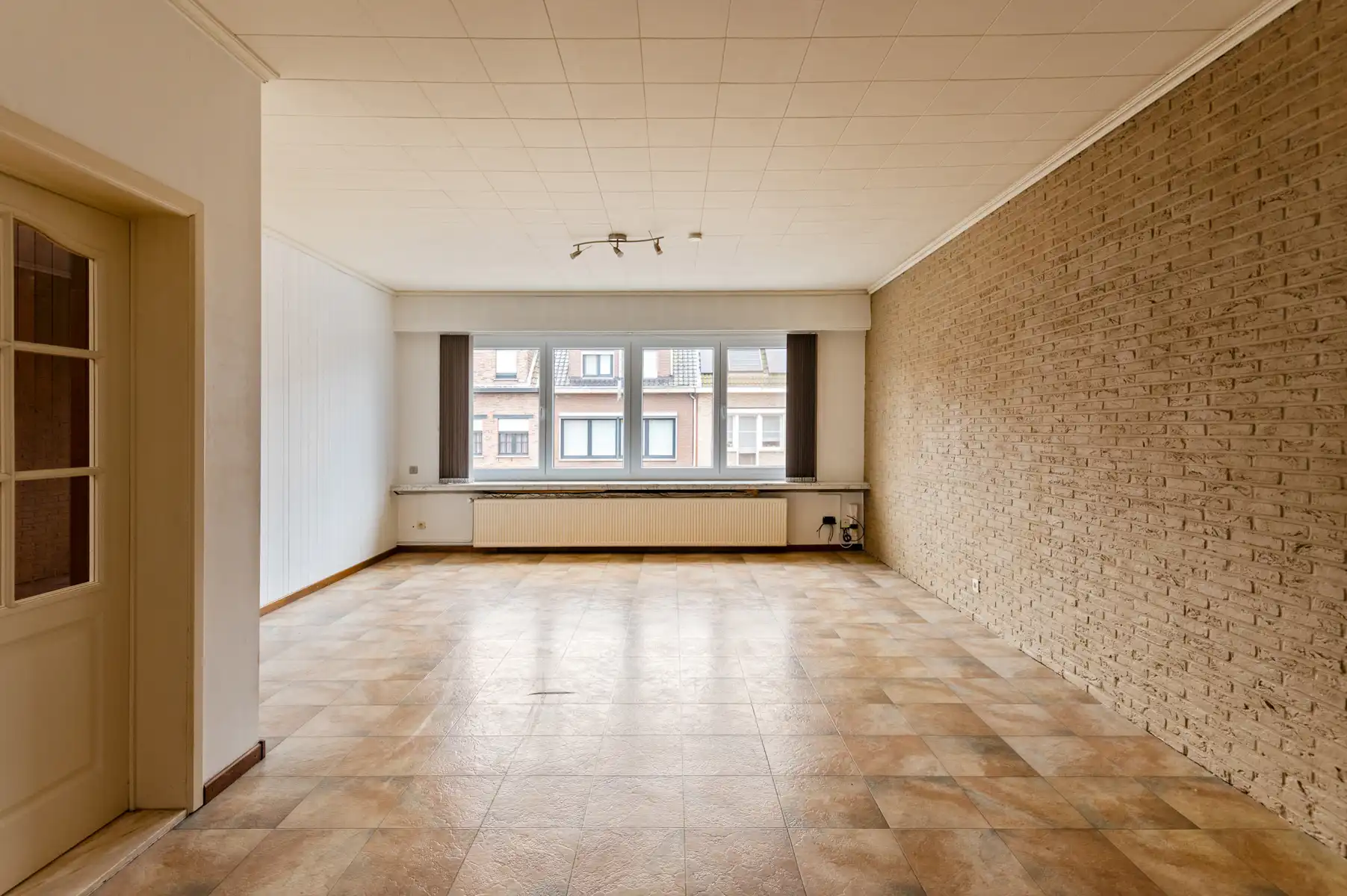 Gelijkvloers handelsruimte met koer én woonst op verdieping foto 16