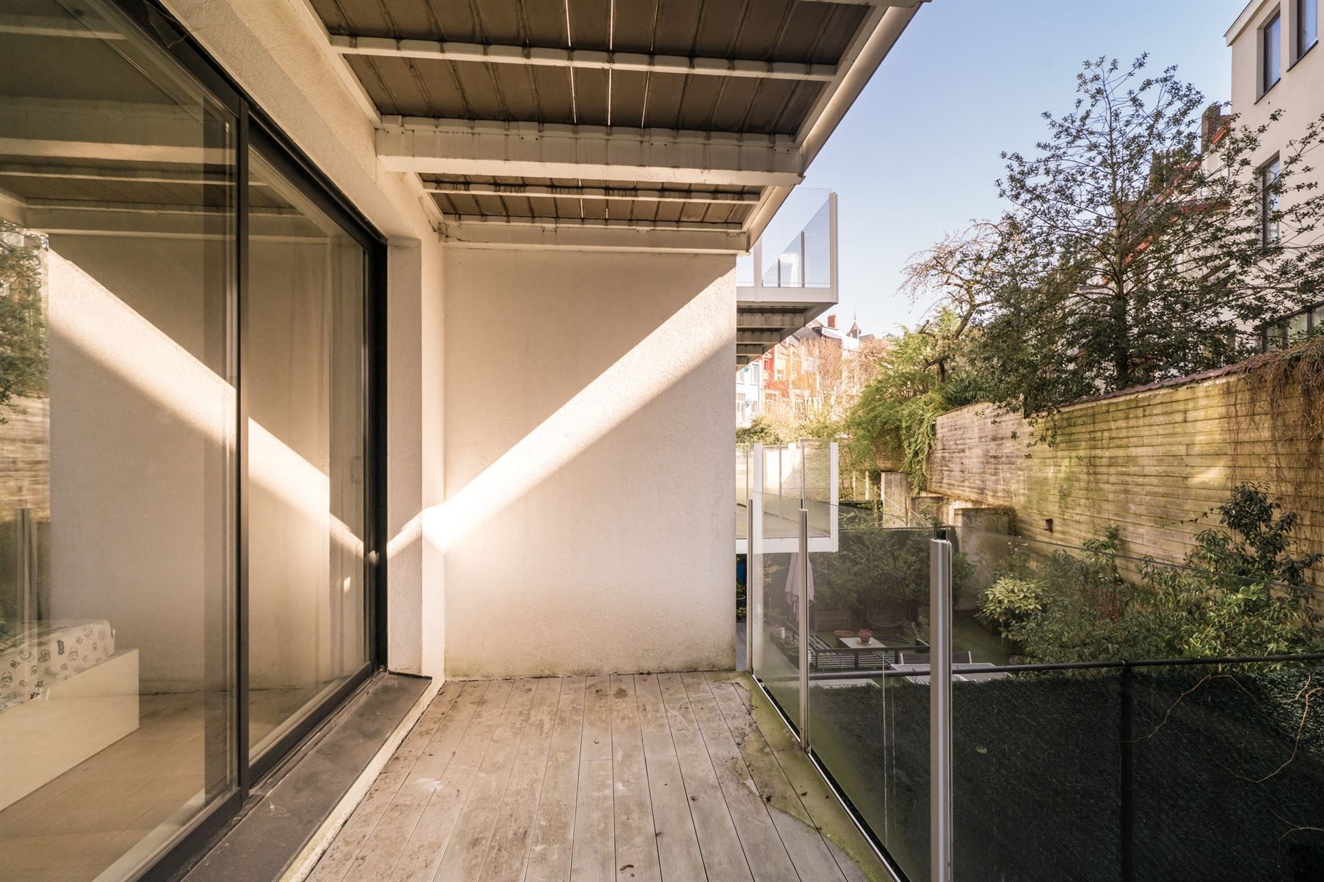 Prachtig, recent 3 slaapkamer duplex appartement met private tuin van 50m² foto 12