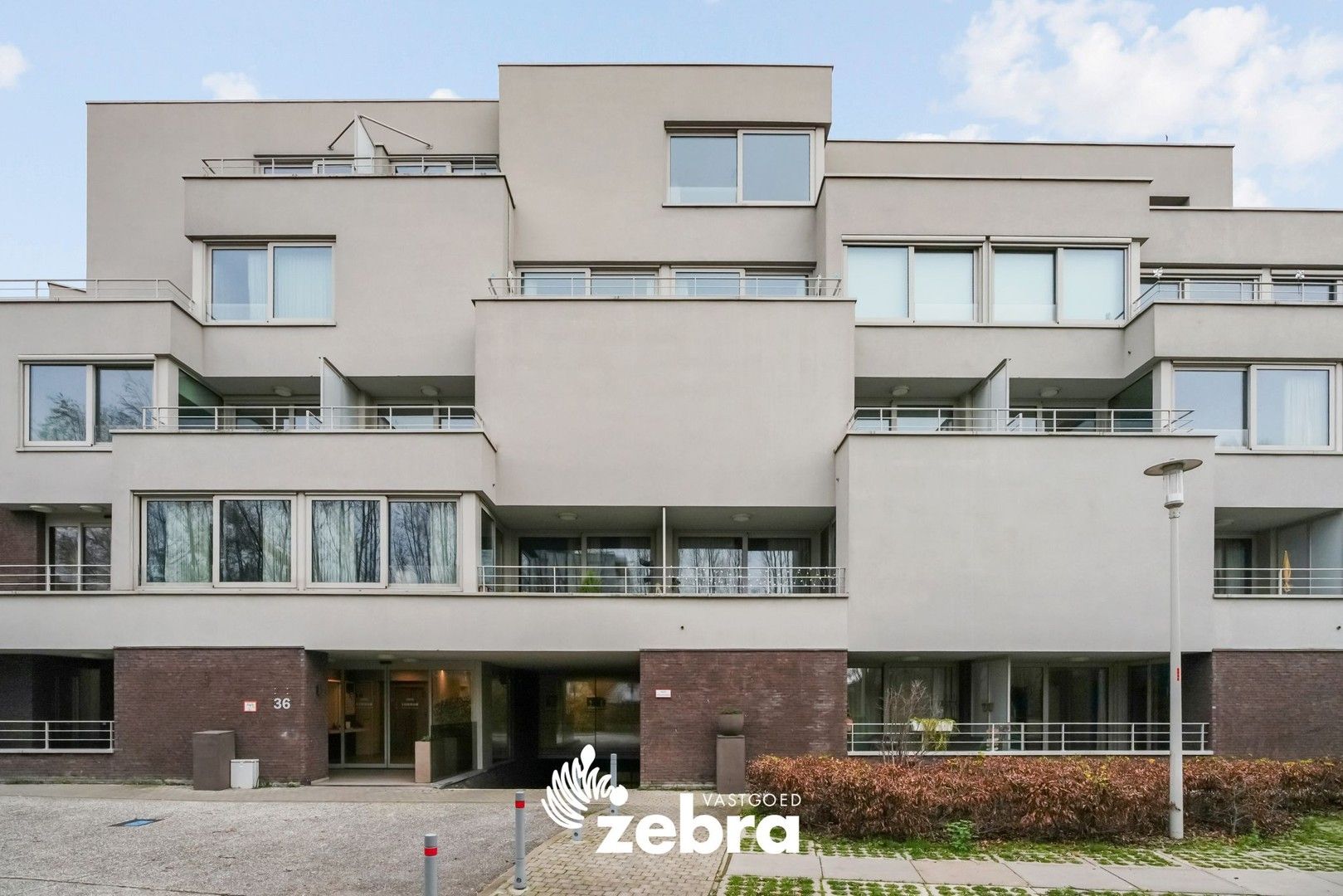 Moderne serviceflat met prachtig zicht op de Leie en autostaanplaats te Deinze! foto 27