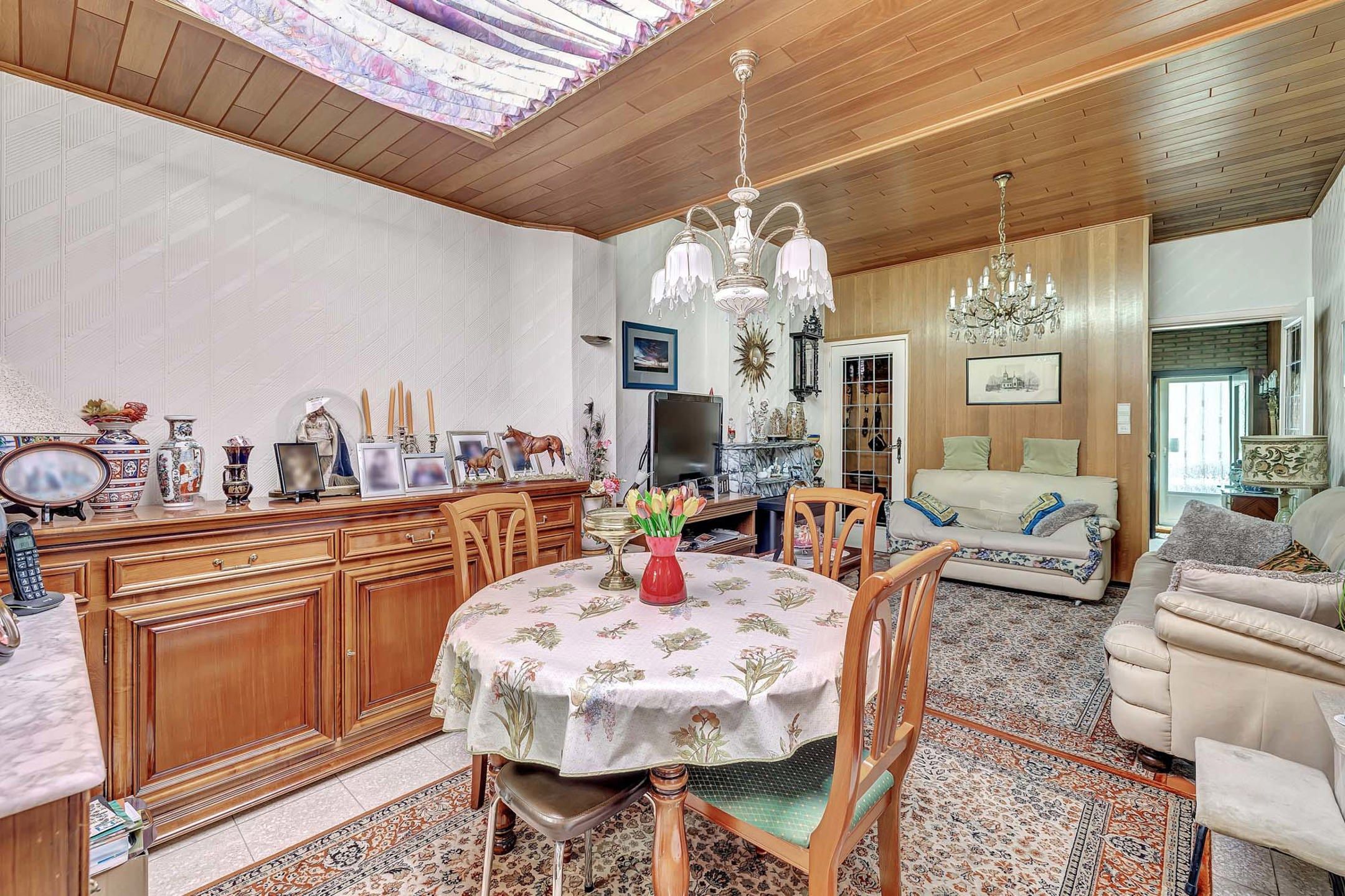 Te renoveren woning met tuin en perceel met garage foto 6