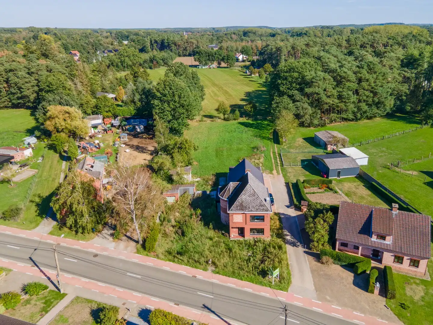 Vrijstaande woning op een ruim perceel van 3.330 m² met prachtig groen uitzicht en tal van mogelijkheden foto 39