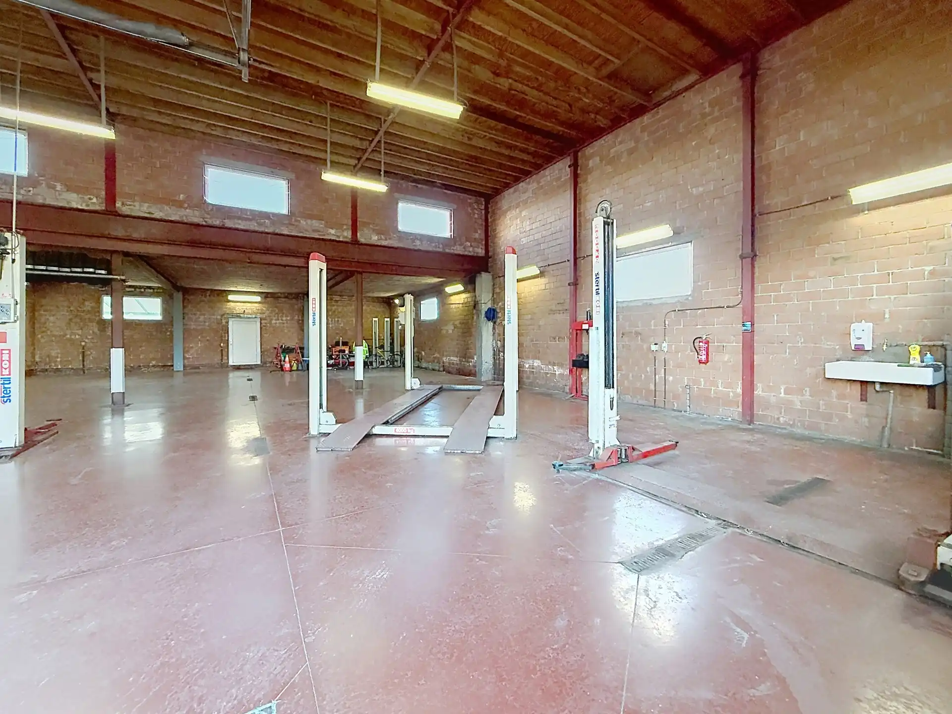 Veelzijdig handelspand met woonst op toplocatie in Grimbergen! foto 5