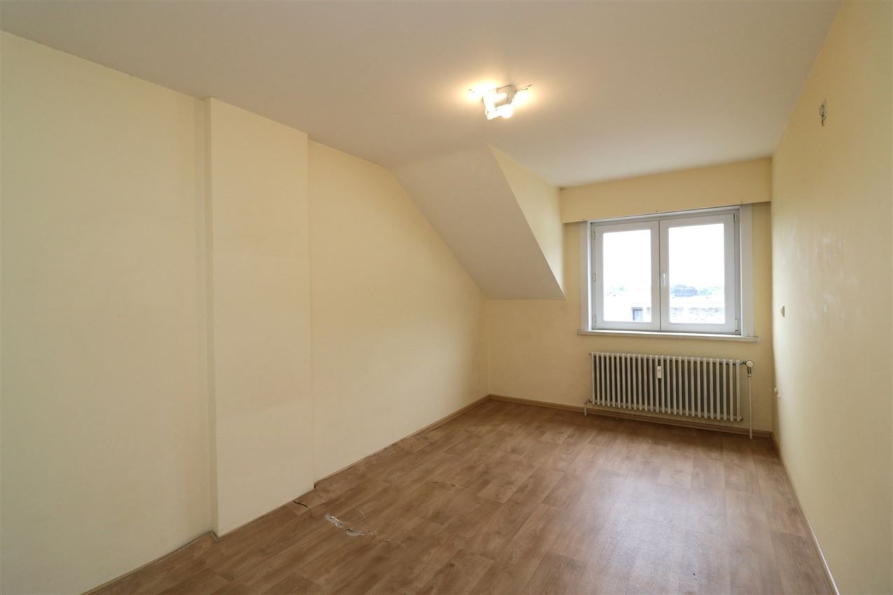 Opbrengsteigendom (handel & 4 app) op toplocatie foto 110