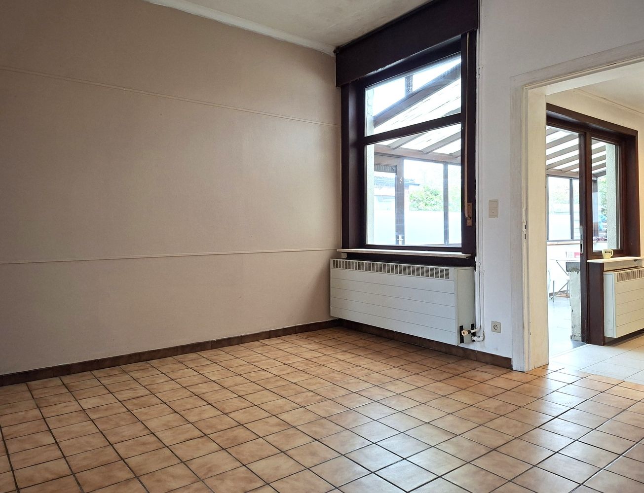 Licht te renoveren woning / 4 slaapkamers en tuin / centrale ligging foto 9