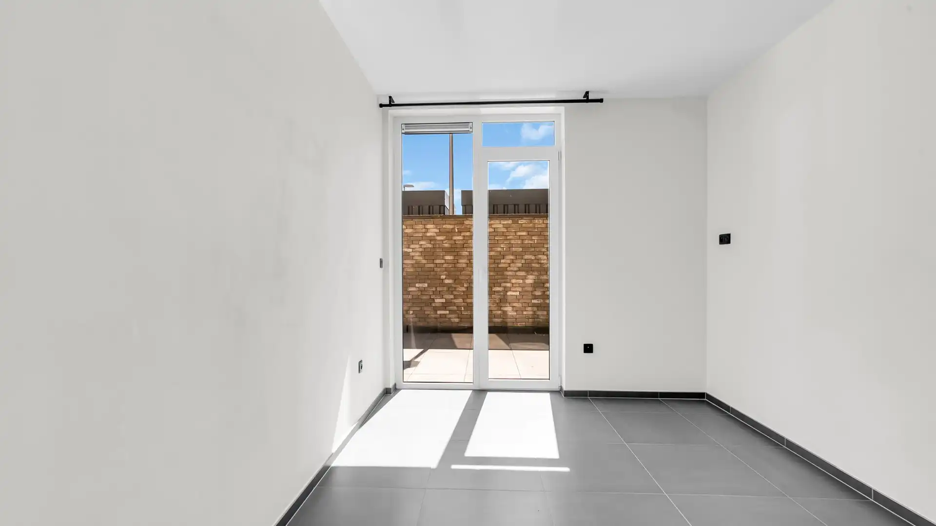 Energiezuinig gelijkvloers appartement met een ruim terras te Maasmechelen foto 9